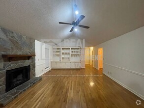 Building Photo - One Month Free! - Charming Three Bedroom H...