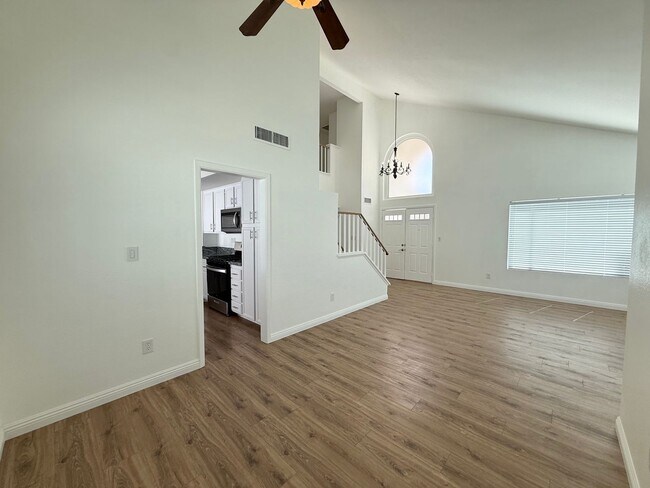 Building Photo - Corner Lot Beauty with Open Living, Guest Suite Down & Expansive Backyard