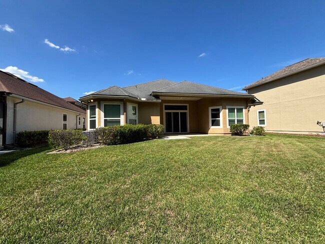 Building Photo - Spacious 4BR/3BA Home with 3-Car Garage, Bonus Office & Covered Patio in St Johns!