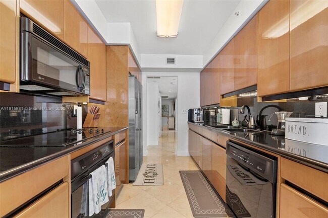 Building Photo - 18671 Collins Ave