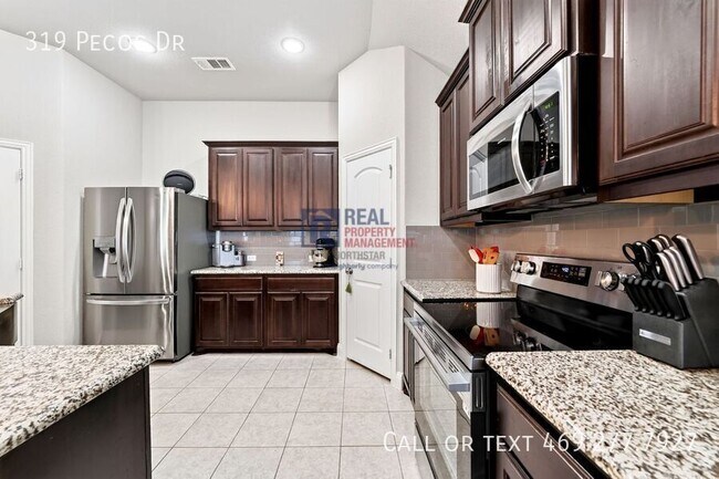 Building Photo - 319 Pecos Dr