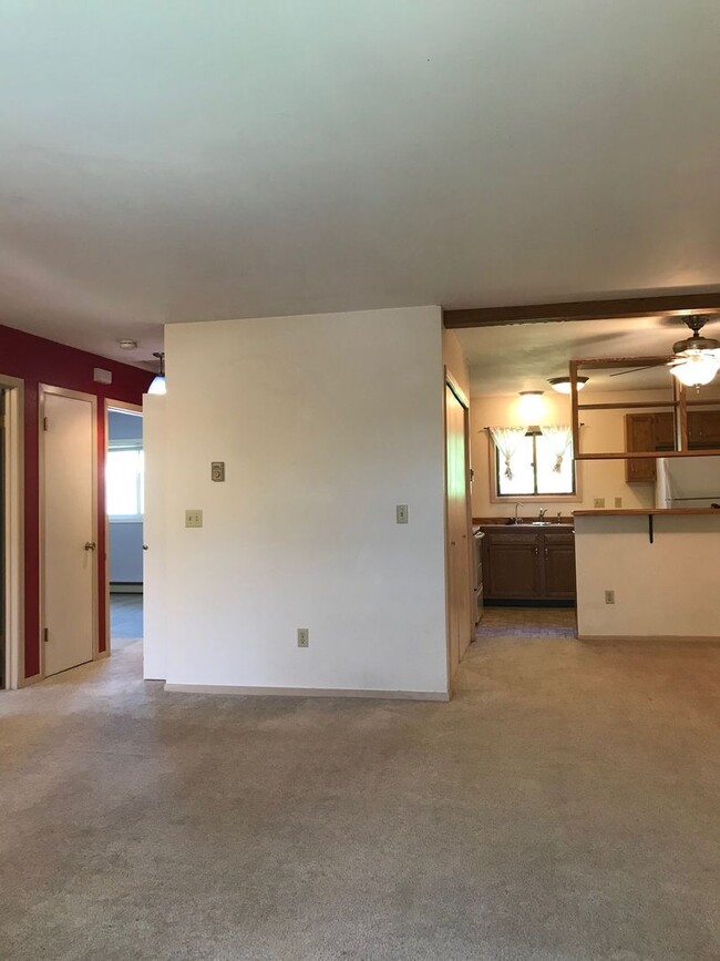 Building Photo - Charming 2-Bedroom Condo Near MSU – Pet Fr...