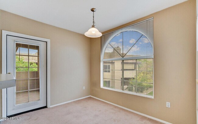 Building Photo - 9451 E Becker Ln