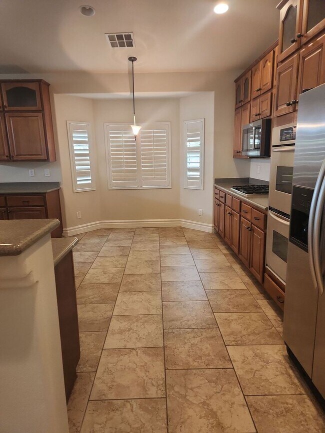 Building Photo - A Stunning 4 Bedroom Home with a Sparkling Pool