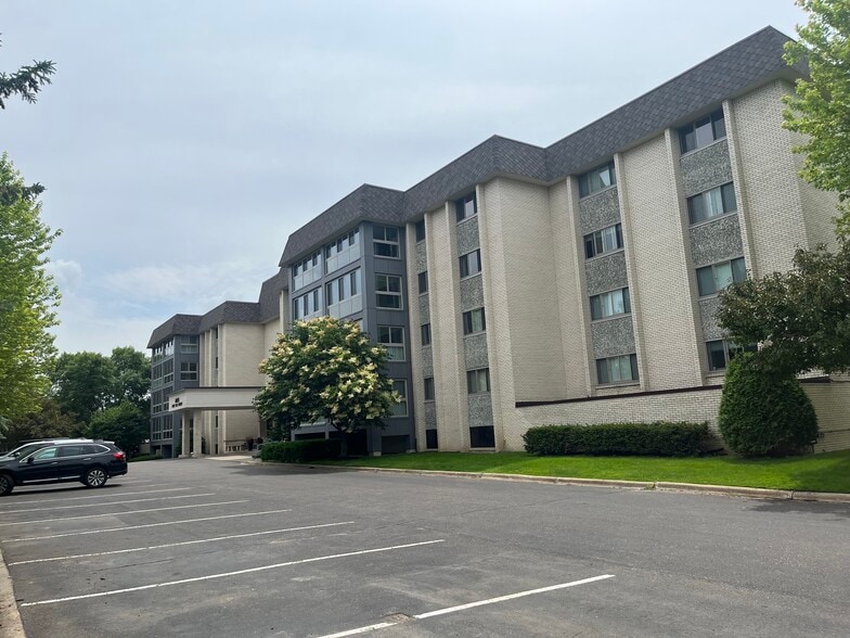 Ample visitor parking in lot and on side street - 4075 W 51st St