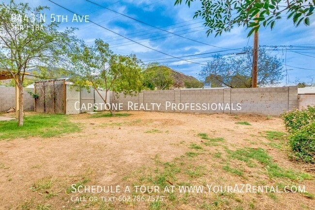 Building Photo - 9443 N 5th Ave