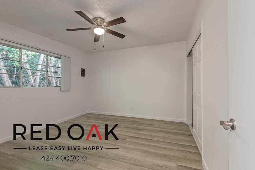 Building Photo - 15901 S Vermont Ave