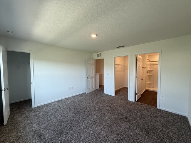 Building Photo - "Charming 2-Bedroom Townhouse Retreat with...