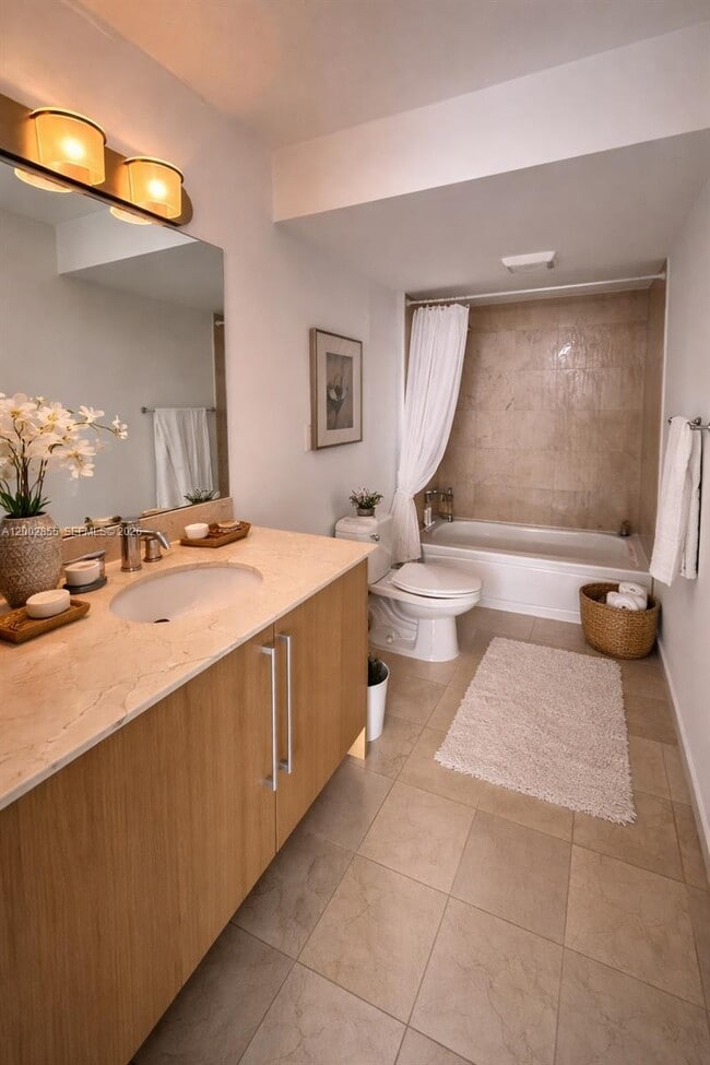 Building Photo - 10275 Collins Ave