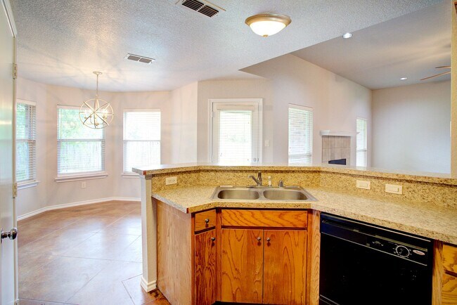 Building Photo - Available July | 4-bedroom 2 bath home in ...
