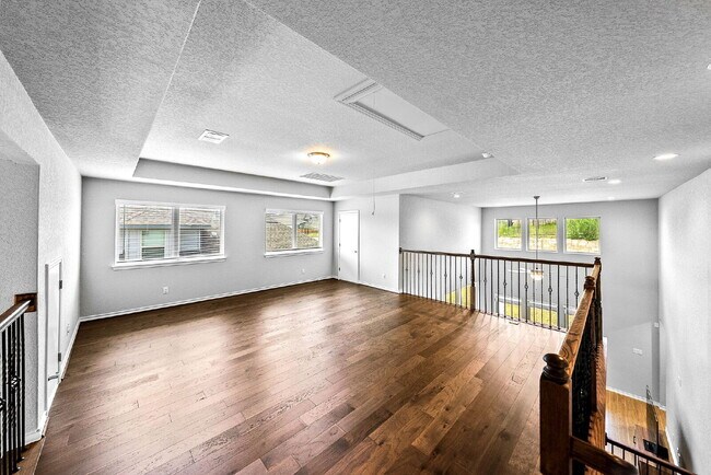 Building Photo - Rare Cibolo Canyons Opportunity | Guest Suite Downstairs, Optional 5th Bedroom, No Carpet, No Rea...