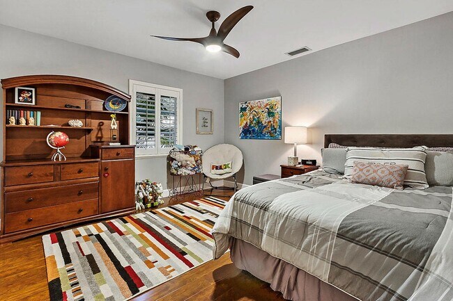 2 bedroom with full wall of closets w built-ins, plantation shutters - 2535 NW 41st St