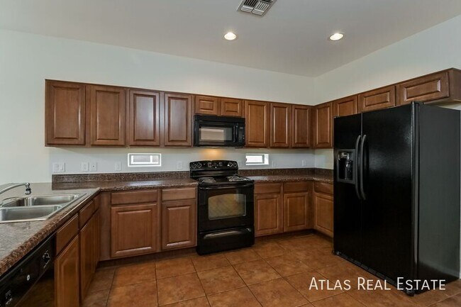 Building Photo - 6650 S Blue Wing Dr