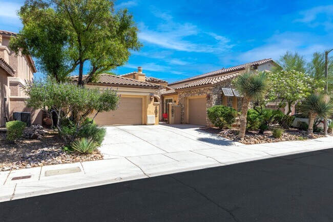 Building Photo - Spacious Mountain’s Edge Home with Den, Sunroom, 3-Car Garage & Private Spa Retreat