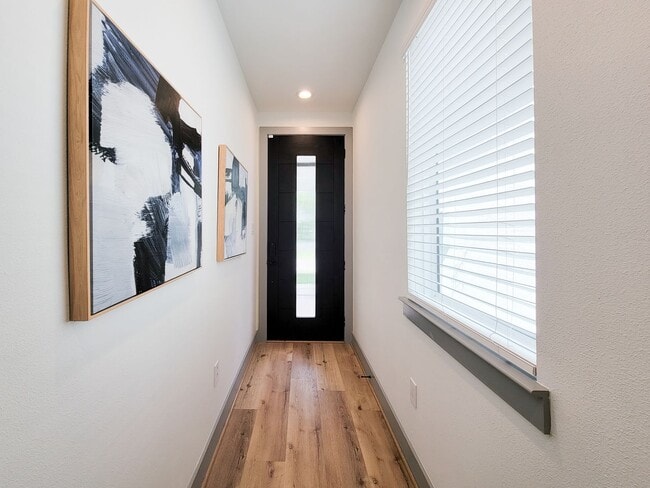 Building Photo - This 4-bedroom, 3-bathroom, two-story residence comes with a generous two-car attached garage. Re...