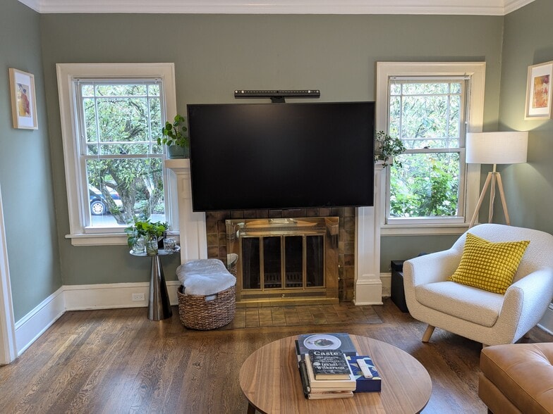 TV is on a mount that can move up and down. - 1974 SE 24th Ave