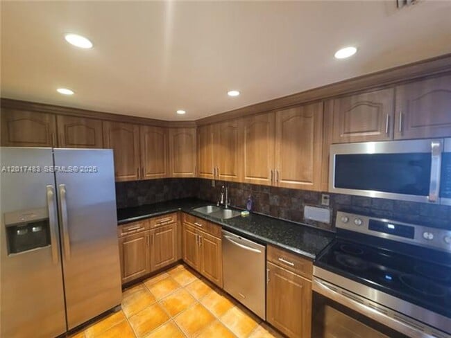 Building Photo - 5401 Collins Ave