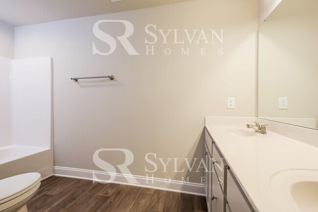 Building Photo - Enjoy living the good life in this 3 bedroom, 2.5 bathroom townhome