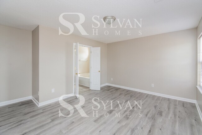 Building Photo - Enjoy living the good life in this 4 bedro...