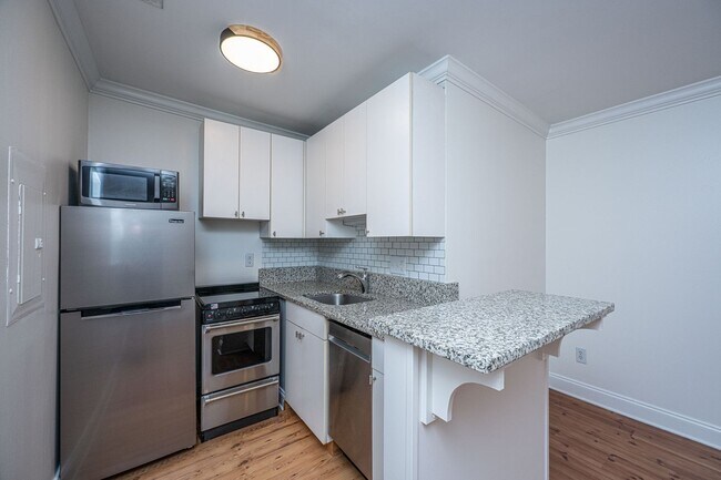 Building Photo - Historic Charm Meets Downtown Energy on Ki...