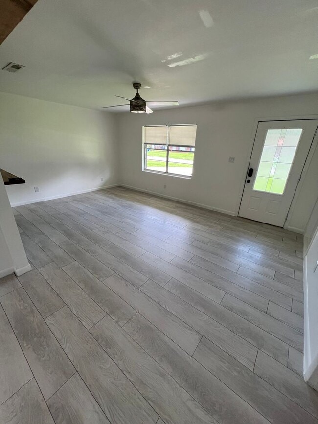 Building Photo - Updated 3BR | Solar Panels + Fenced Yard