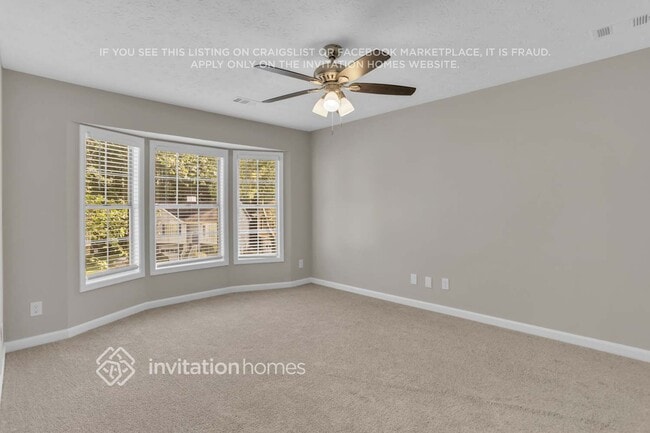 Building Photo - 6017 Happy Trails Ct