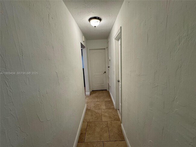 Building Photo - 8540 NW 25th Ct