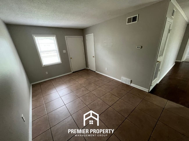 Building Photo - HALF OFF FIRST MONTHS RENT! Charming 3BR/1.5BA in 38118 | Hardwood Floors & Spacious Fenced Backyard