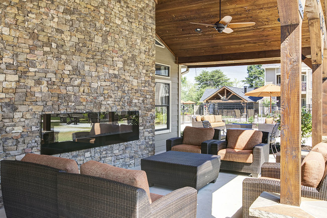 Outdoor Lounge - The Arbors at Breckinridge Apartment Homes