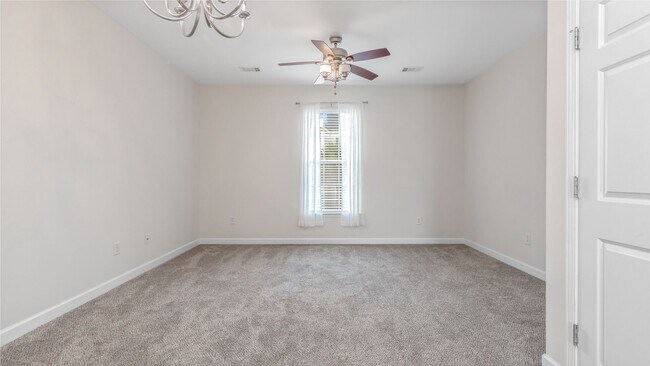 Building Photo - Located just Steps from Shopping, Dining, & Entertainment in The Market Common