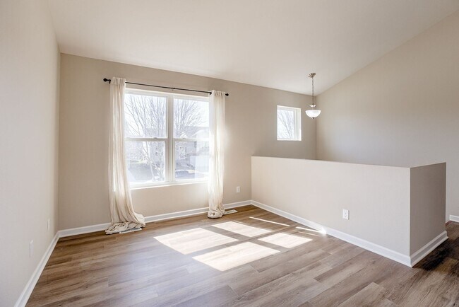 Building Photo - Bright & Spacious Elkhorn Home with Finish...