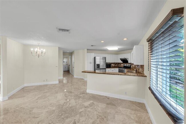 Building Photo - 5911 NW 59th Ave