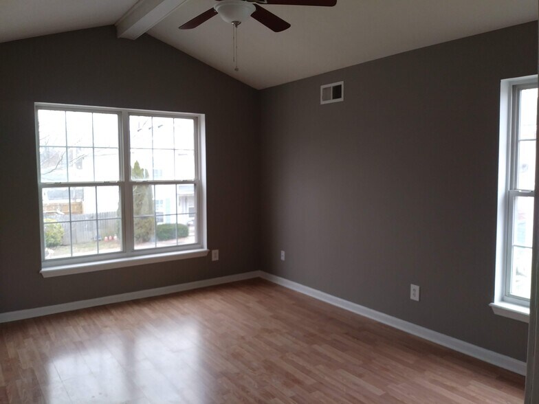 Master Bedroom on 2nd floor with wood flooring - 1216 Lipps Ln