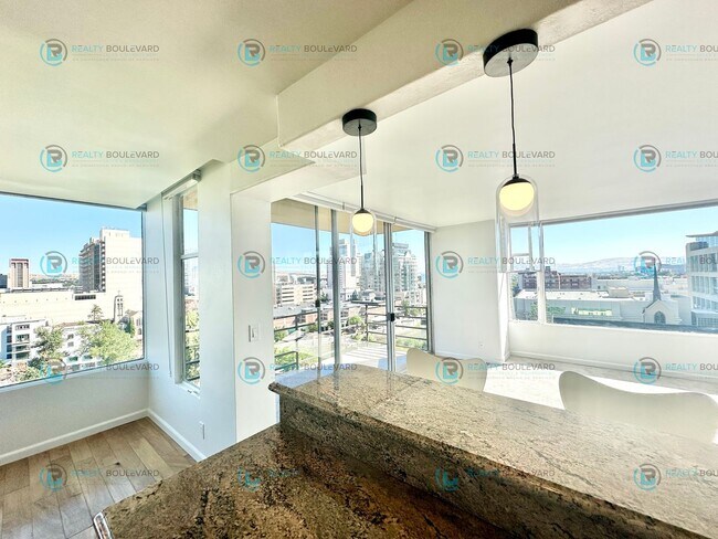 Building Photo - Exquisite 1-bedroom, 2-bathroom condo Overlooking the beautiful Truckee River with covered parking!
