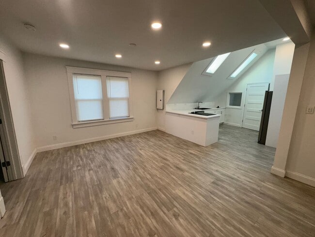 Building Photo - Stylish & Modern Living in the Heart of Tr...