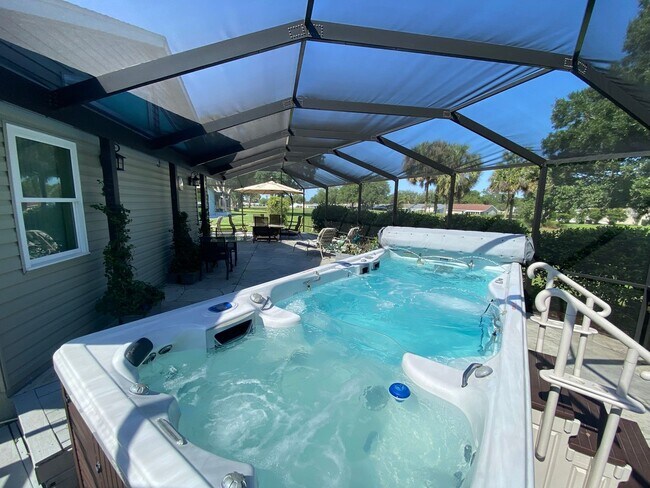 Building Photo - Spectacular Fully Furnished SEASONAL Home with Golf Course views and pool*