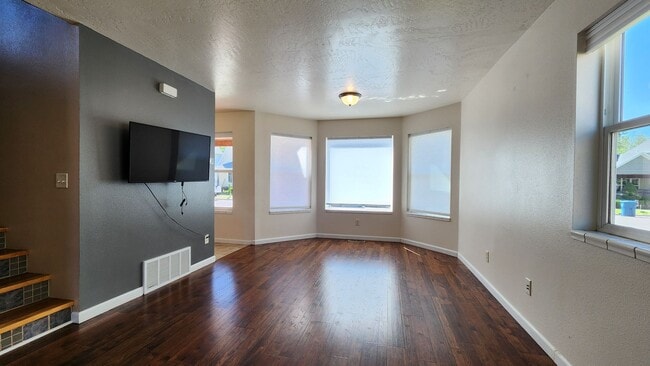 Building Photo - Beautiful House with Yard and Pets Considered