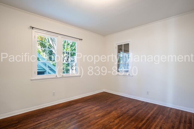 Building Photo - 8159 Willoughby Ave