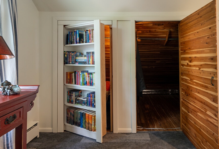 Third floor bonus room has a hidden reading nook and plenty of storage, including cedar - 1697 Pinehurst Ave
