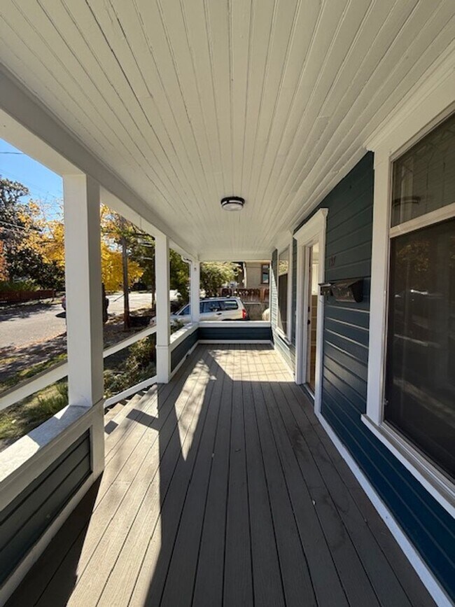 Building Photo - Updated ground floor unit in vintage duple...