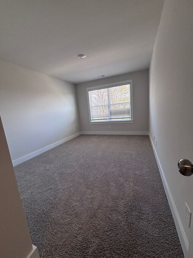Building Photo - Brand new three-bedroom, 2.5-bath townhome