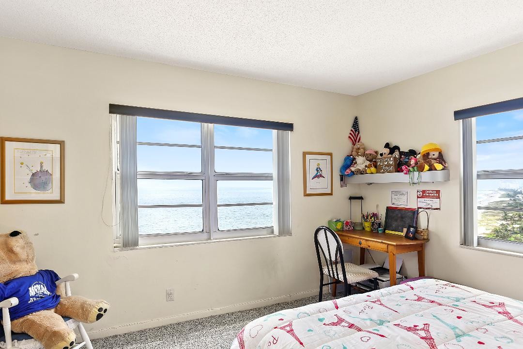 Guest bedroom with ocean view. - 1500 S Ocean Blvd