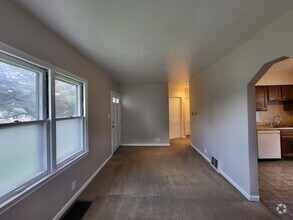 Building Photo - Don't miss this fully fenced back yard, de...