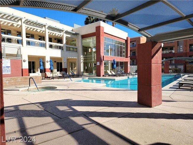 Building Photo - MIDRISE 2 BED, 2 BATH CONDO IN GUARD-GATED...