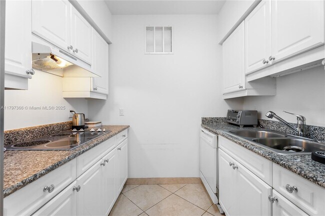 Building Photo - 4779 Collins Ave