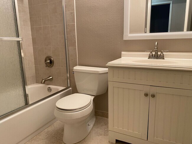 Building Photo - Remodeled 2 Bedroom 2 Bath Condo in Park-like Cedar Gables Community!