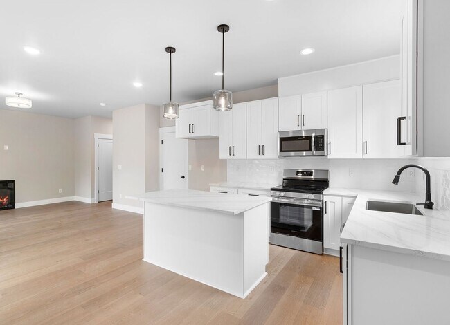 Building Photo - Beautiful New Construction 4-Bedroom Home with a Main-Level Bedroom, Designer Finishes, Attached ...