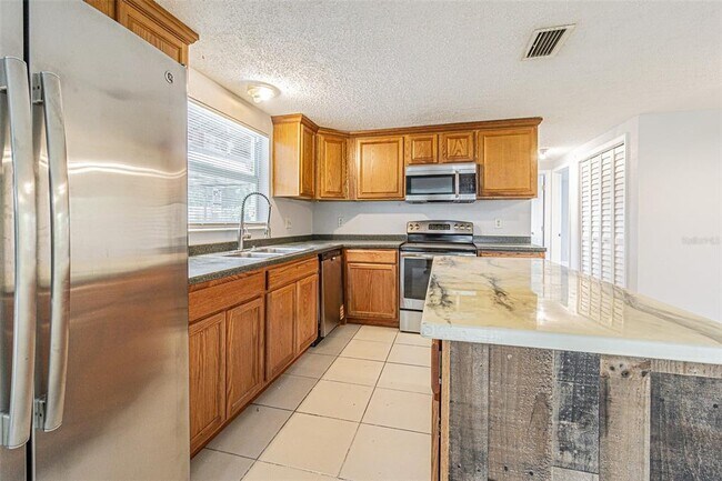 Building Photo - 6321 Spanish Main Dr