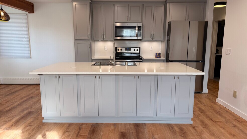 Full sized refrigerator - 3001 E 42nd Ave