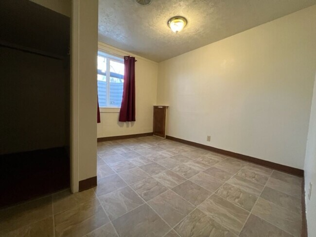 Building Photo - Bi-Level House w/ Massive Backyard, Storage, & Character!